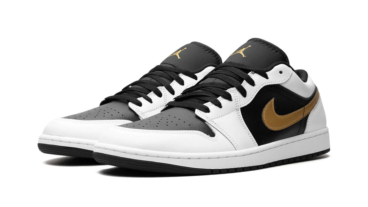 Air Jordan 1 Low "Gold Swoosh" sneaker product image 2 | Foot Spikes