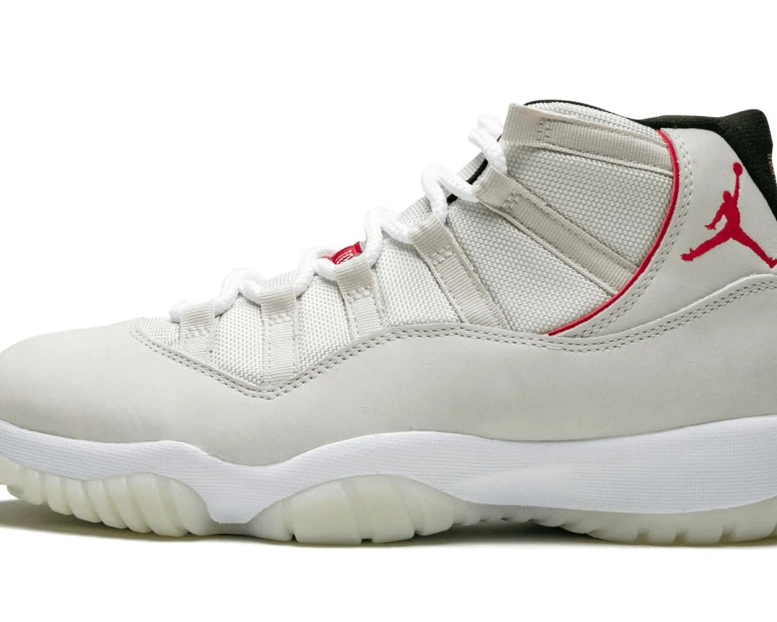Air Jordan 11 Retro "Platinum Tint" sneaker product image 1 | Foot Spikes