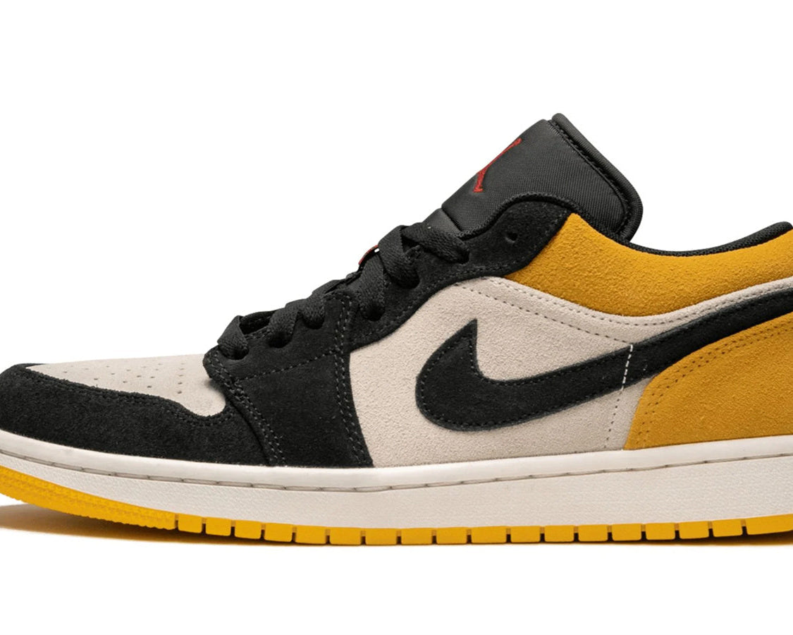Air Jordan 1 Low "University Gold" sneaker product image 1 | Foot Spikes