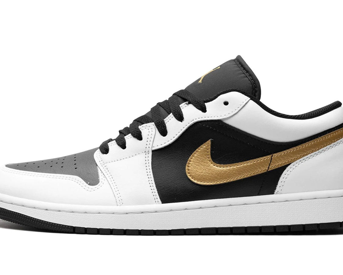 Air Jordan 1 Low "Gold Swoosh" sneaker product image 1 | Foot Spikes