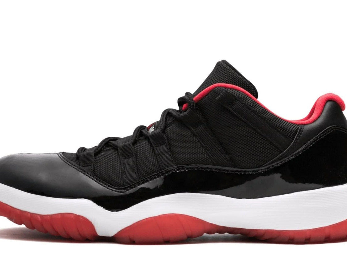 Air Jordan 11 Retro Low "Bred" sneaker product image 1 | Foot Spikes
