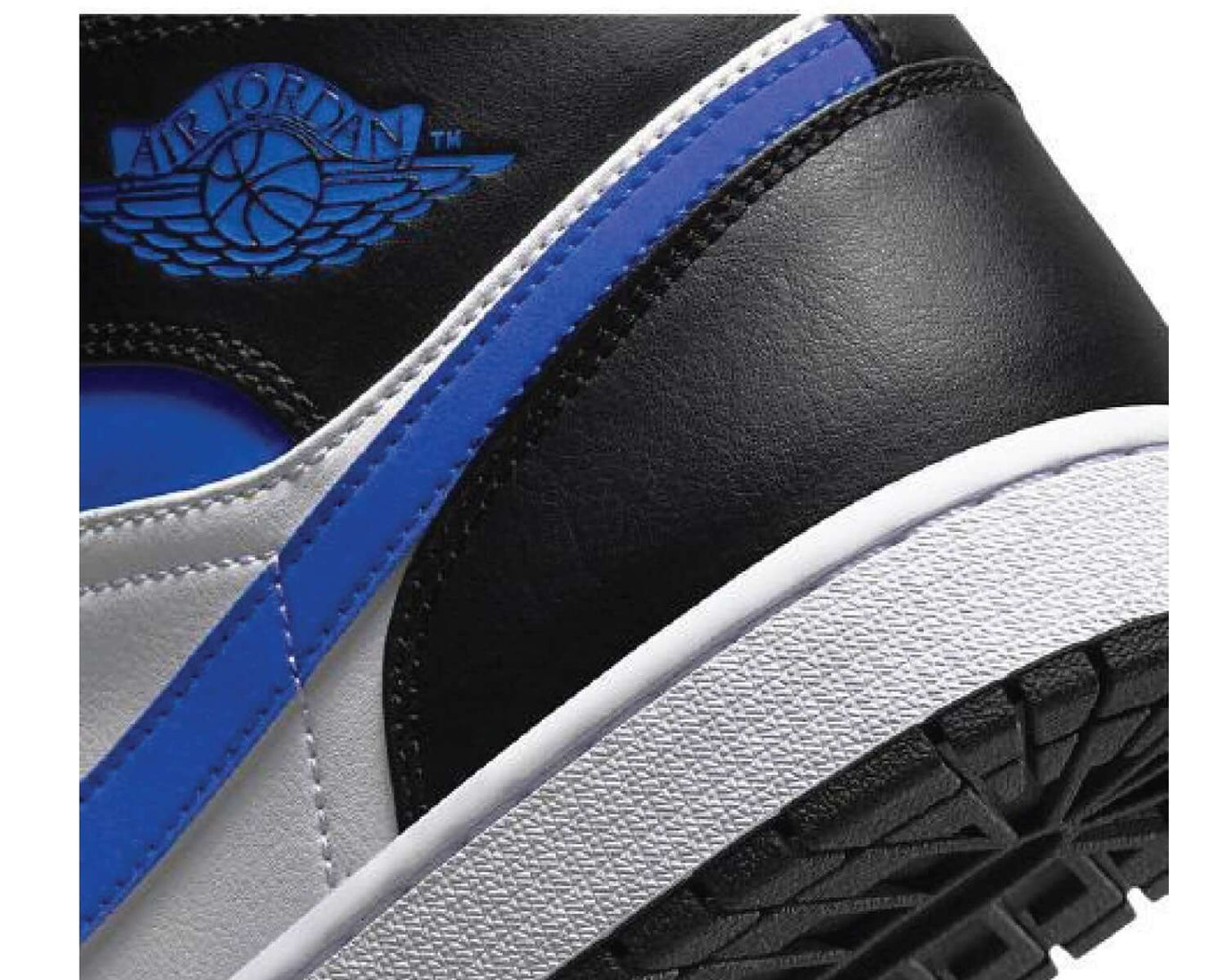 Air Jordan 1 Mid Black White Royal Blue sneaker product image 2 | Foot Spikes