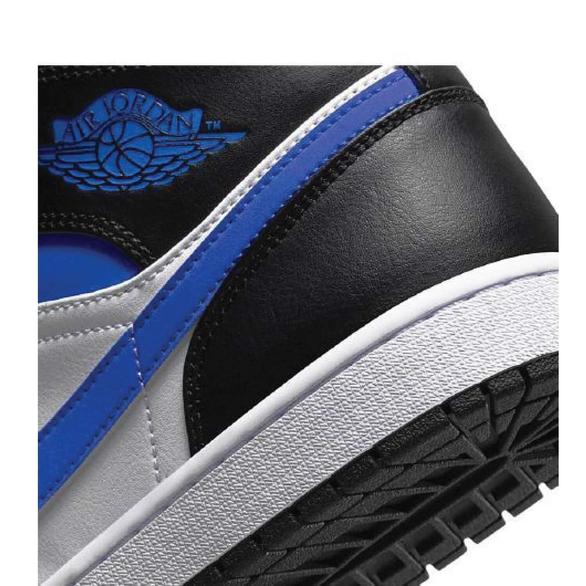 Air Jordan 1 Mid Black White Royal Blue sneaker product image 2 | Foot Spikes
