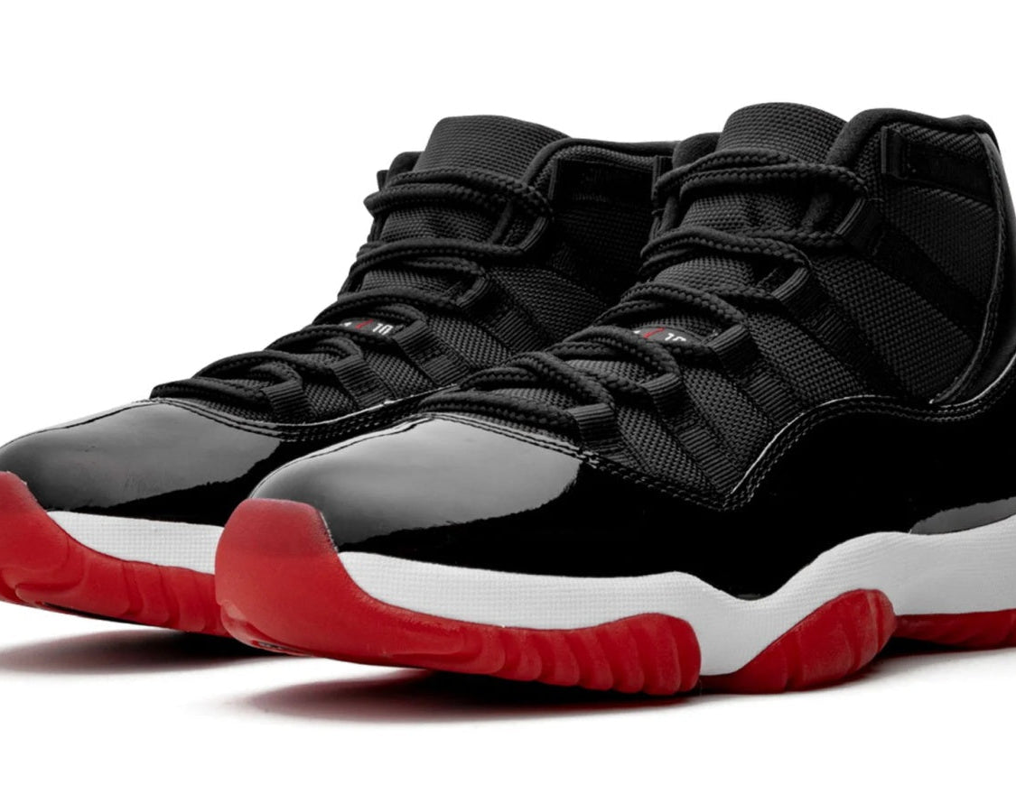 Air Jordan 11 Retro "Bred 2019" sneaker product image 2 | Foot Spikes