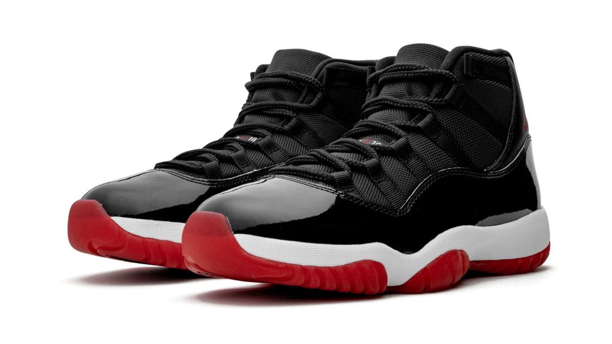 Air Jordan 11 Retro "Bred 2019" sneaker product image 2 | Foot Spikes