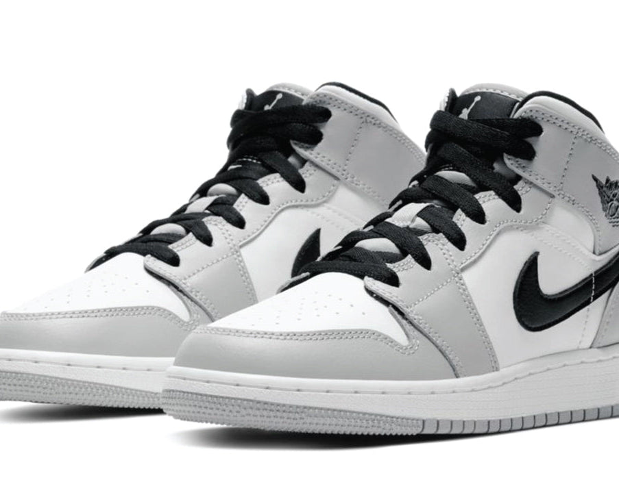 Air Jordan 1 Mid GS Light Smoke Grey sneaker product image 2 | Foot Spikes