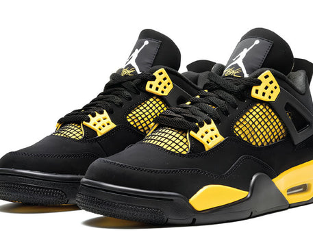 Air Jordan 4 Retro Thunder 2023 sneaker product image 2 | Foot Spikes
