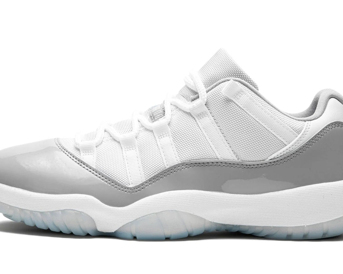 Air Jordan 11 Low "White Cement" sneaker product image 1 | Foot Spikes