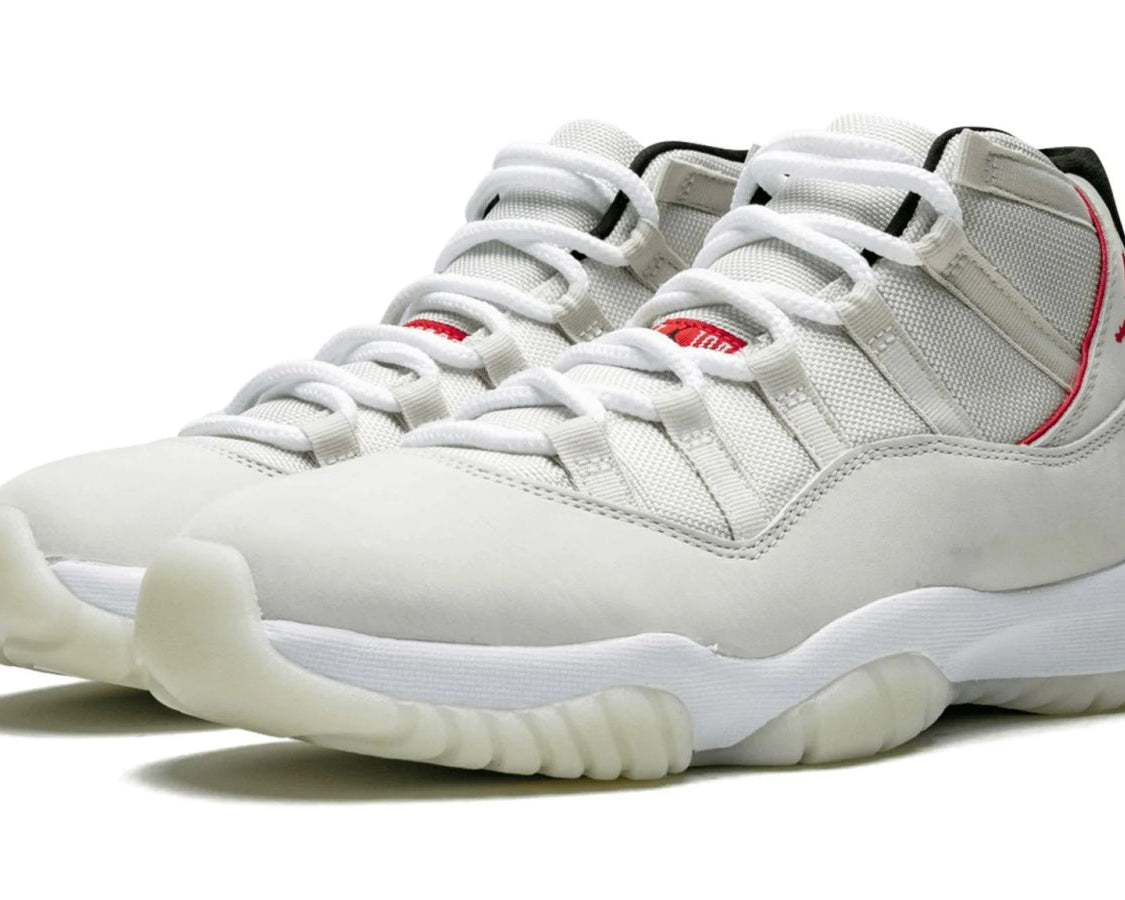 Air Jordan 11 Retro "Platinum Tint" sneaker product image 2 | Foot Spikes